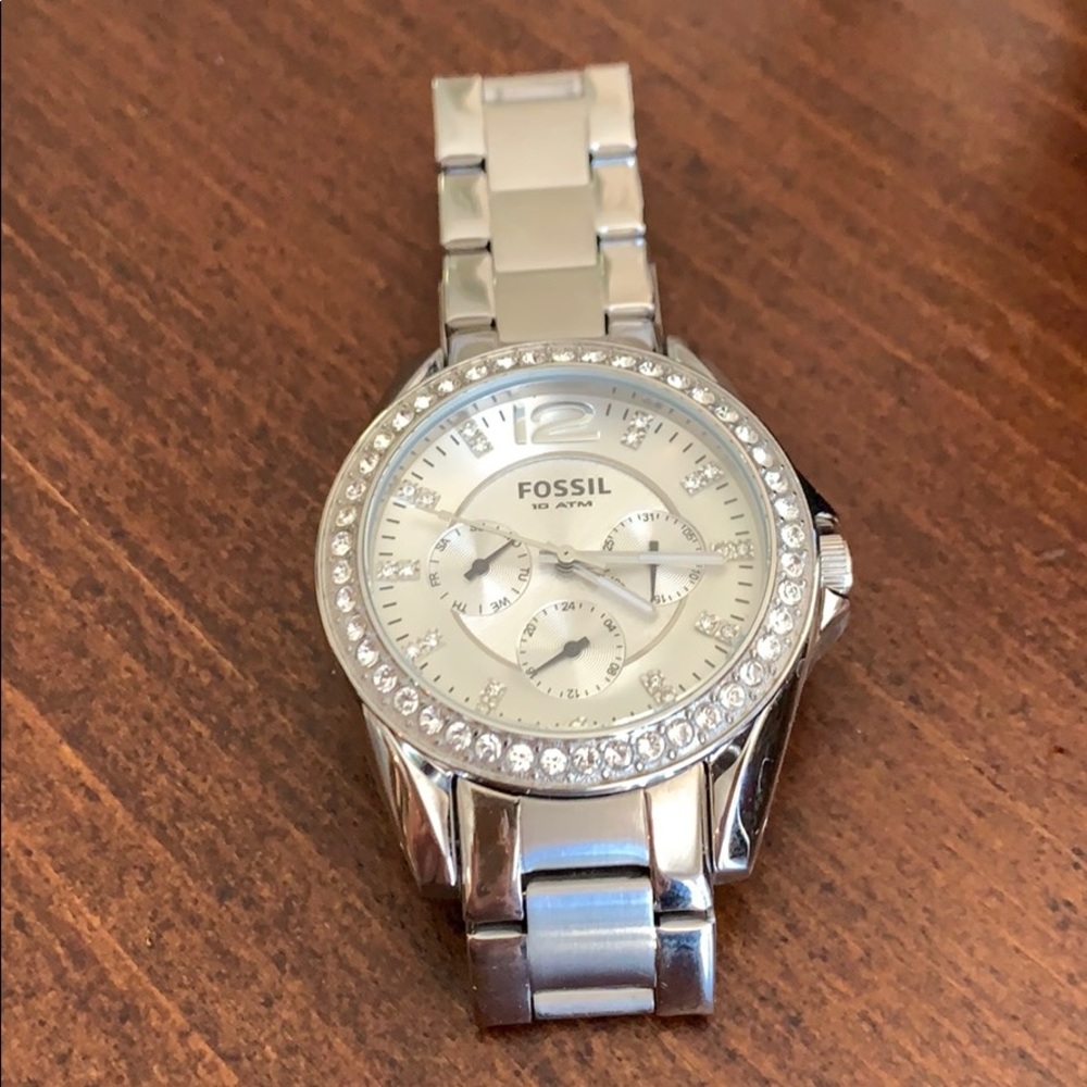 Women’s silver Fossil watch